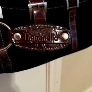 I’m selling a Tignanello black suede shoulder purse.